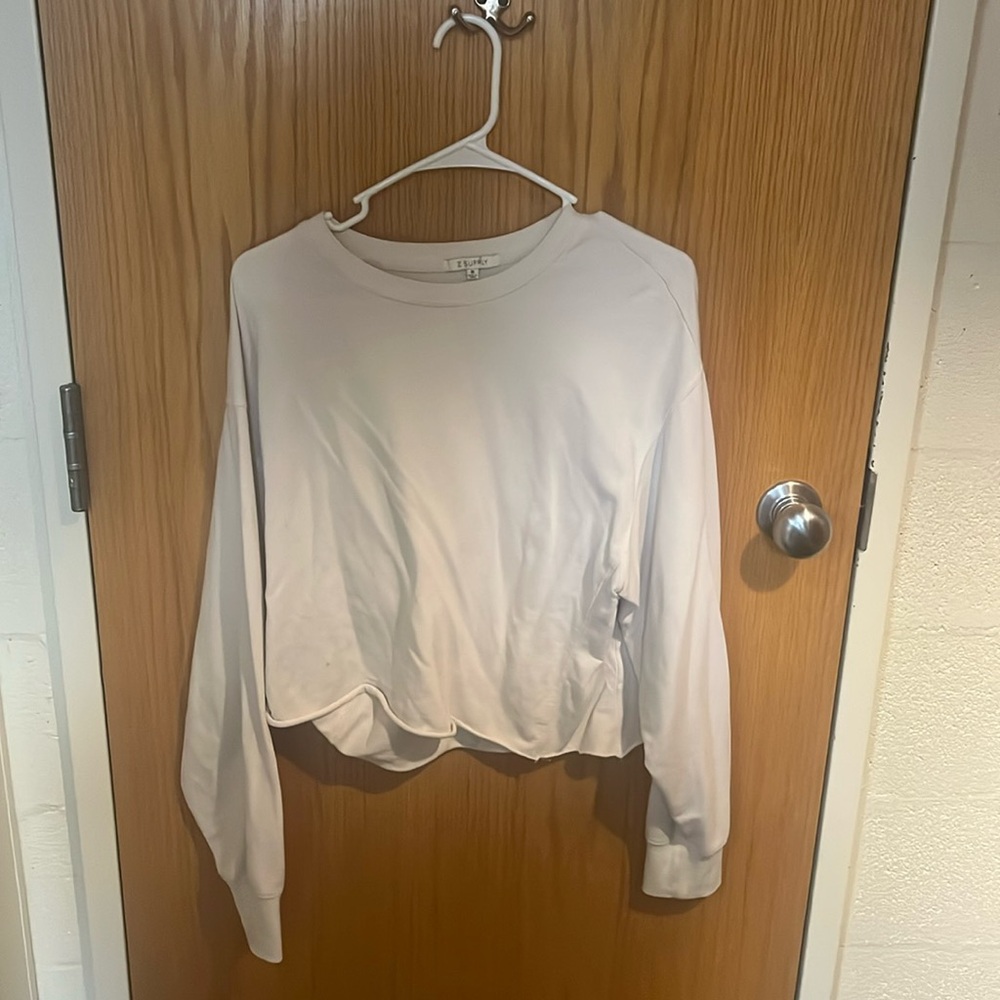 Long sleeved cropped cream shirt